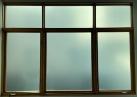 Interior design film with some privacy Commercial Window Tint for privacy in a energy efficient building